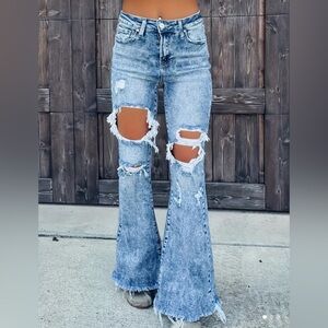 Blue frayed trim flare jeans